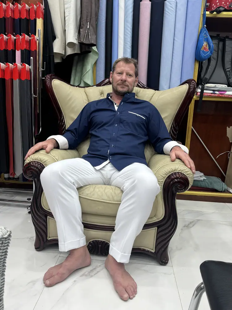 Client in a bespoke garment at Marco Bespoke Tailor, Bangrak