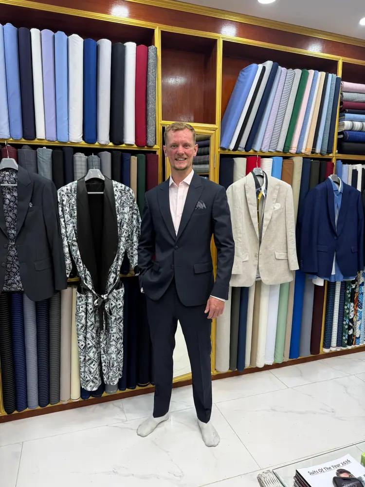 Client in a bespoke garment at Marco Bespoke Tailor, Bangrak
