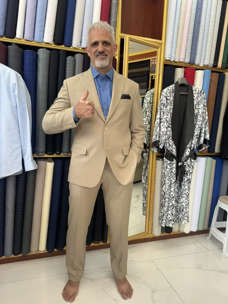Client in a bespoke garment at Marco Bespoke Tailor, Bangrak